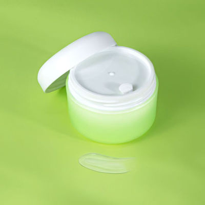 Pote de creme de plástico PP branco verde 100% fresco com prazo de entrega de 20 dias para embalagens cosméticas